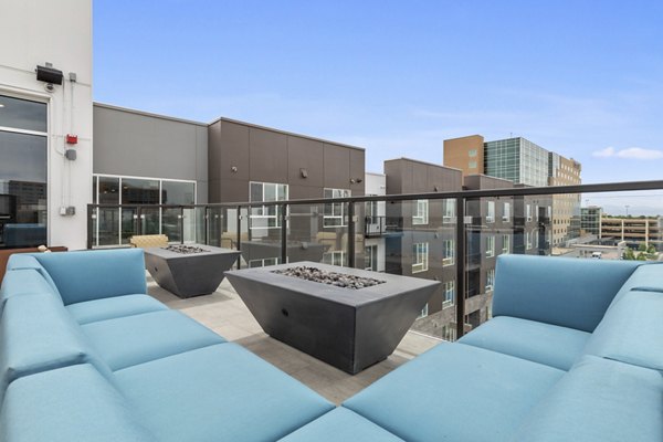 Cozy outdoor fire pit area at Legacy at Fitz Apartments, ideal for relaxation and social gatherings