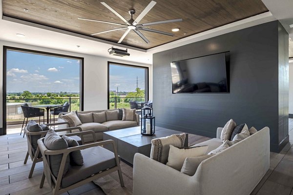 Clubhouse with modern design and seating areas at The Grayson Apartments