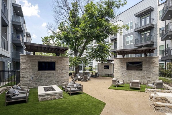 Beautiful courtyard with lush gardens at The Grayson Apartments