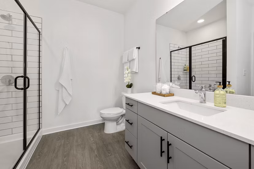 Stylish bathroom with modern fixtures at Bowery West Apartments