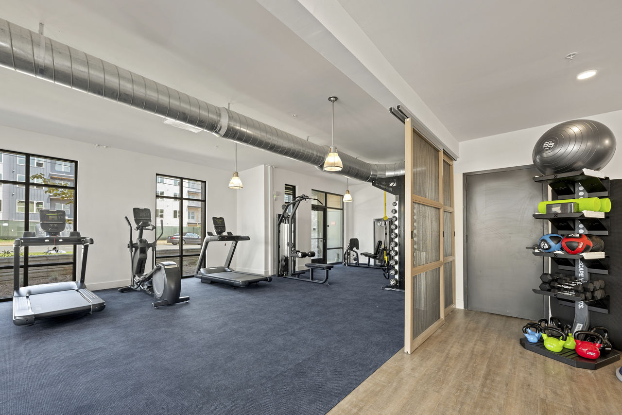 Gym at Bowery West Apartments And Townhomes (3 of 5)