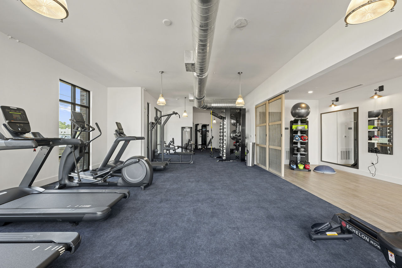 Gym at Bowery West Apartments And Townhomes (4 of 5)