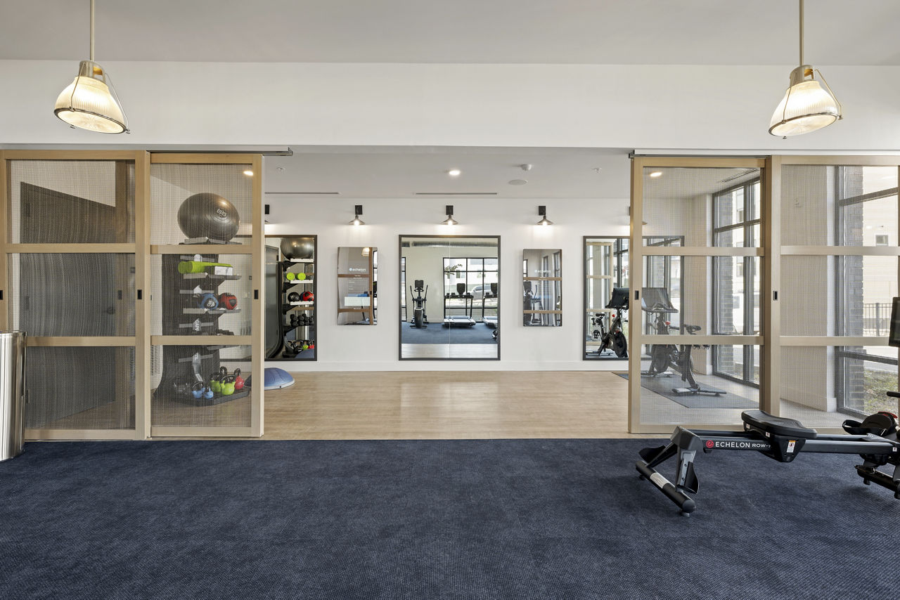 Gym at Bowery West Apartments And Townhomes (5 of 5)