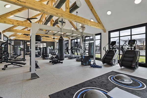 State-of-the-art fitness center with modern equipment at The Gabriel Apartments
