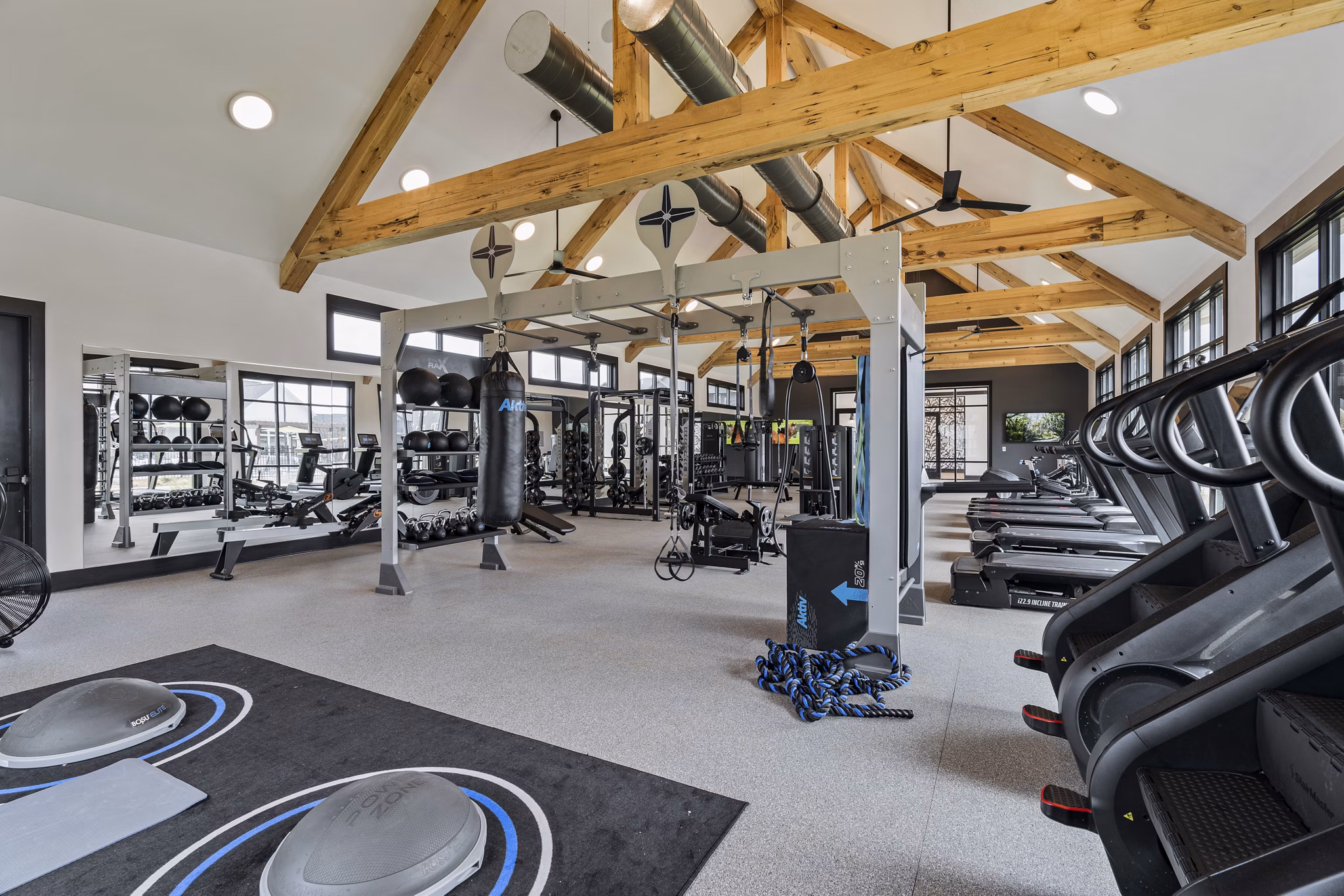 State-of-the-art fitness center featuring modern equipment at The Gabriel Apartments
