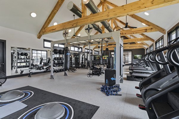 State-of-the-art fitness center featuring modern equipment at The Gabriel Apartments