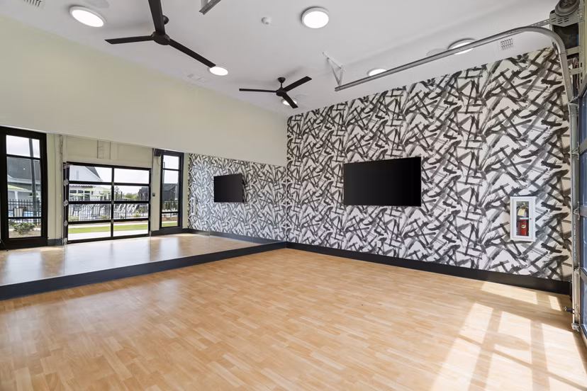 State-of-the-art fitness center with modern equipment at The Gabriel Apartments