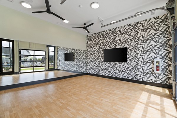 State-of-the-art fitness center with modern equipment at The Gabriel Apartments