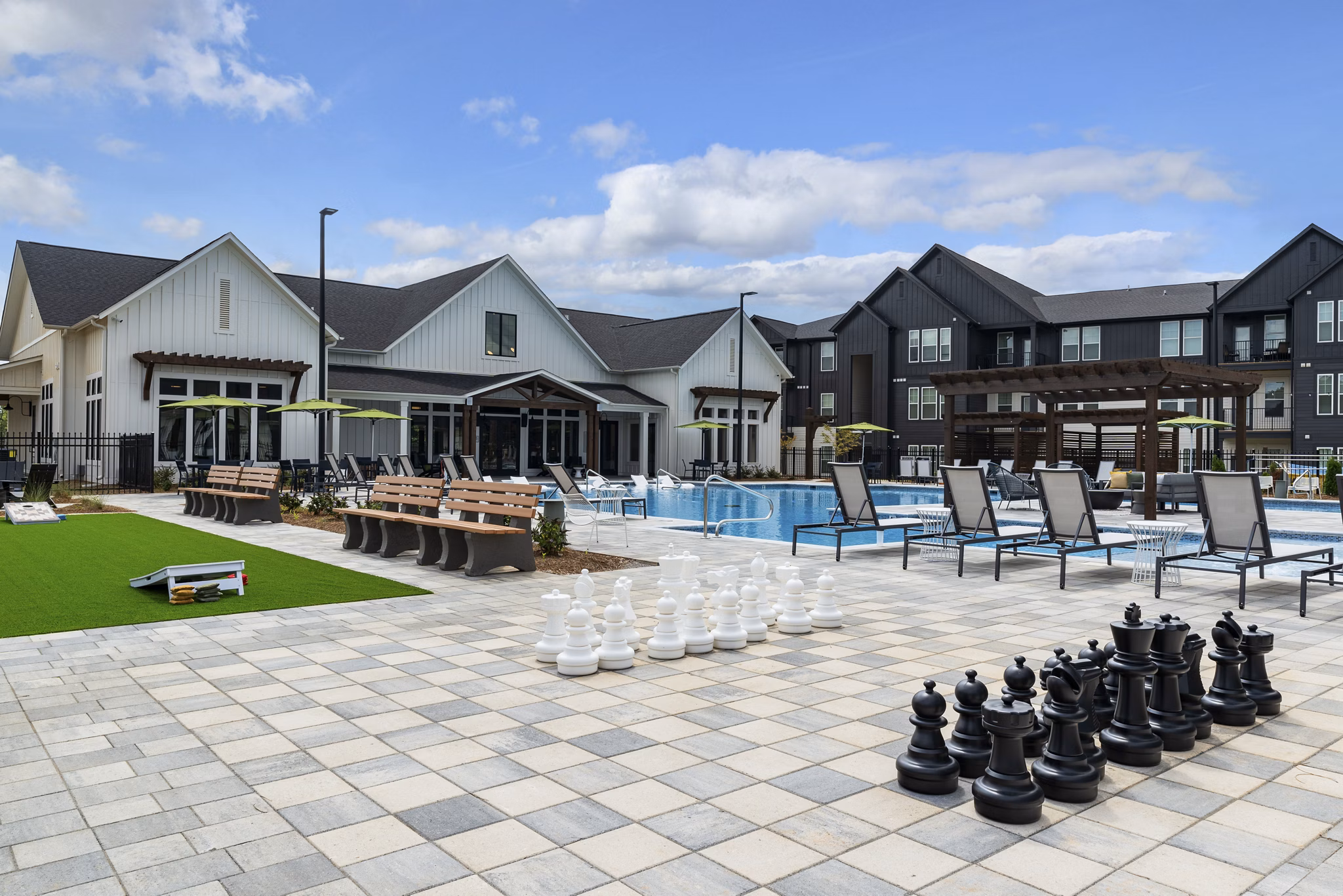 Chic outdoor patio with modern seating at The Gabriel Apartments, luxury living spaces in prime urban location
