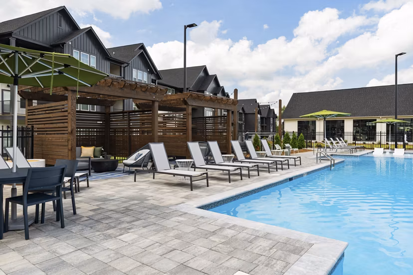 Luxurious pool with lounge chairs at The Gabriel Apartments, a  luxury property