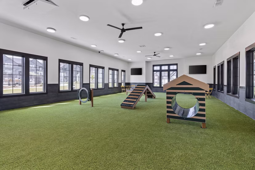 Modern recreational area with gaming tables at The Gabriel Apartments for luxury living