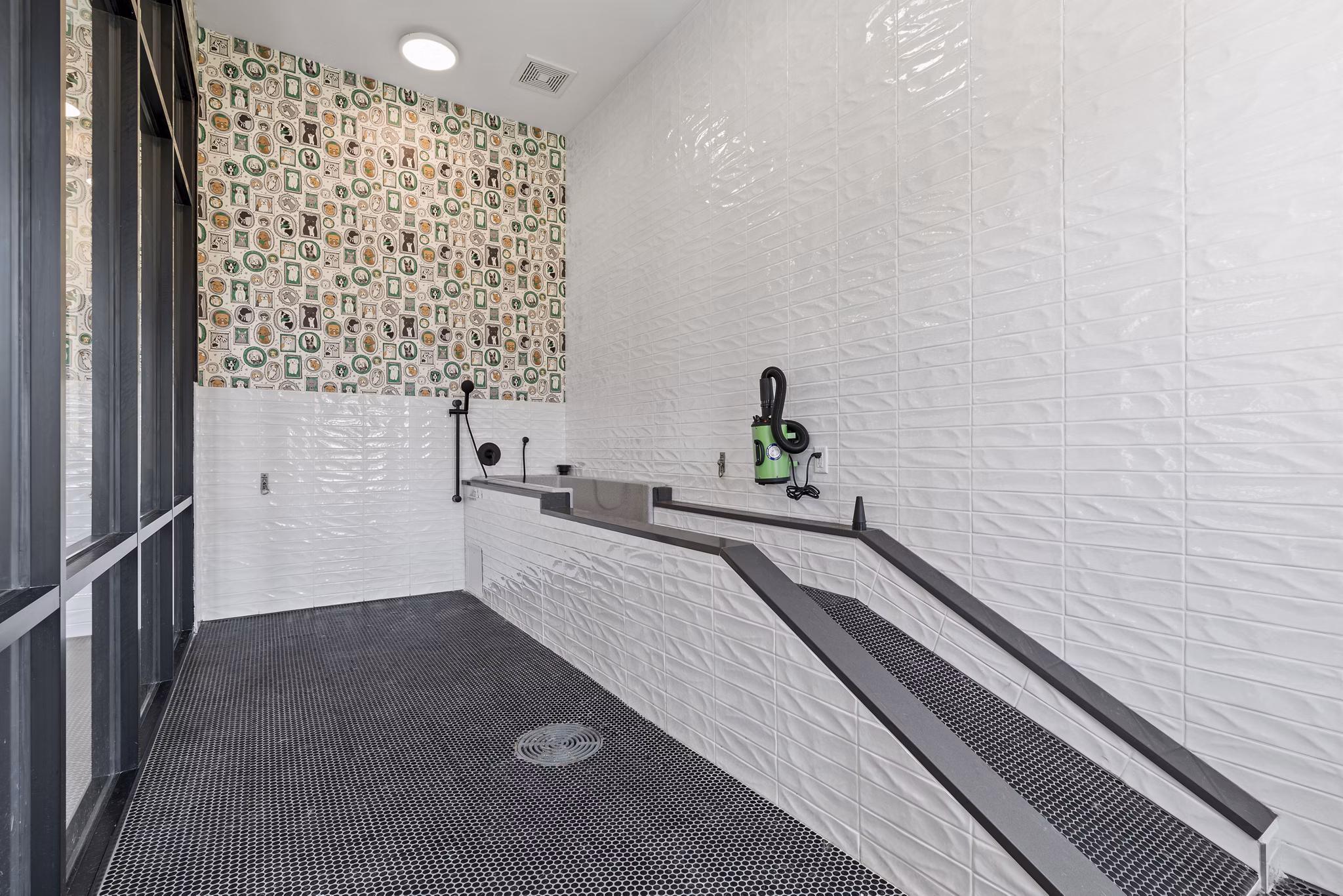 Recreational area featuring modern seating and gaming tables at The Gabriel Apartments