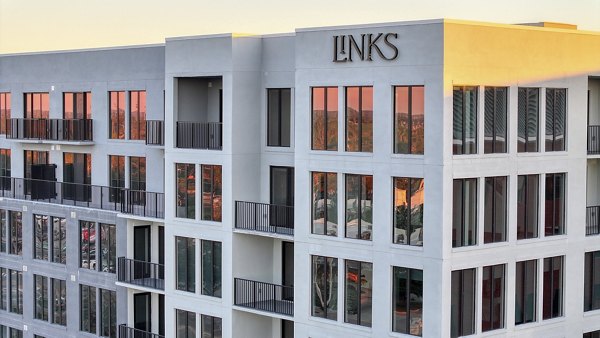 building at Aster & Links Apartments