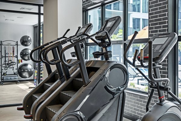 fitness center at Aster & Links Apartments