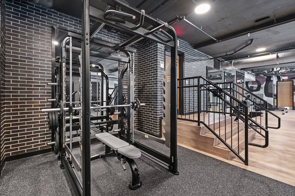 fitness center at Aster & Links Apartments