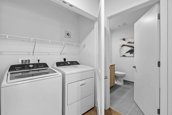 laundry room at Aster & Links Apartments