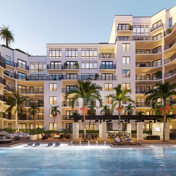Relaxing outdoor pool at Aster & Links Apartments with luxury loungers and scenic views