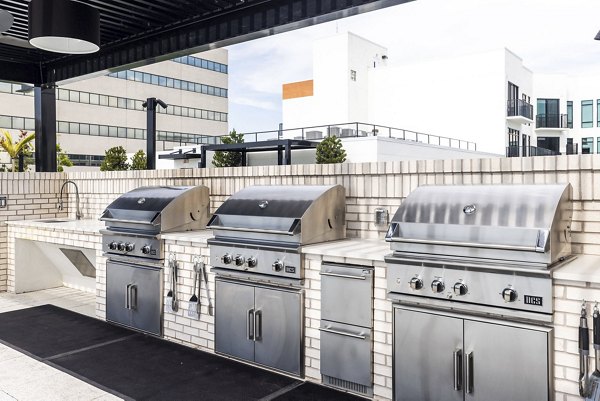 grill area at Aster & Links Apartments