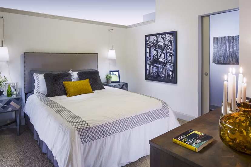 Cozy bedroom with modern design at 1377 Apartments: luxury city living