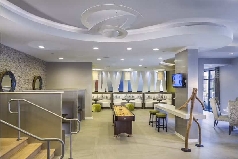 Modern clubhouse with plush seating at 1377 Apartments, ideal for socializing and relaxation