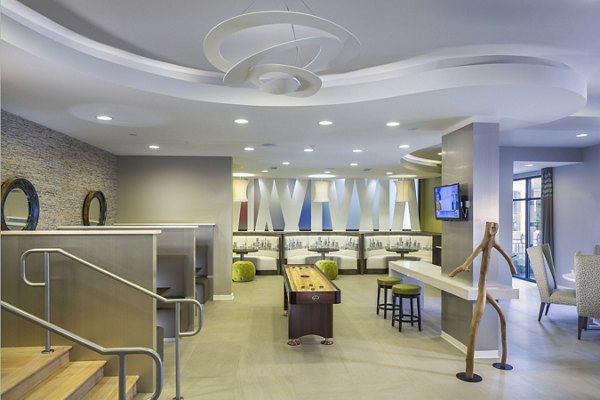 Modern clubhouse with plush seating at 1377 Apartments, ideal for socializing and relaxation