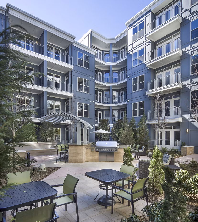 Grill area with modern patio at 1377 Apartments, ideal for outdoor gatherings and leisure