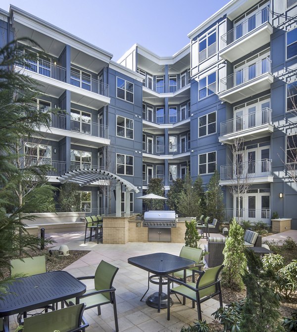 Grill area with modern patio at 1377 Apartments, ideal for outdoor gatherings and leisure