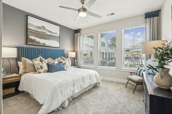 Inviting bedroom with cozy furnishings at 4000 Margaret Apartments