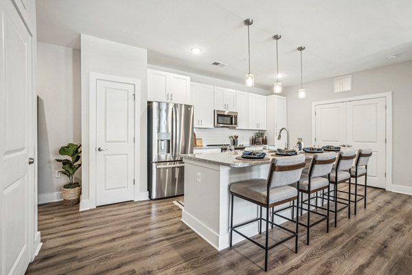 Elegant dining room with modern furniture at 4000 Margaret Apartments