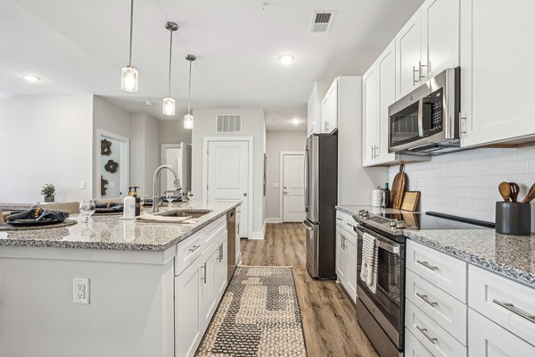 Spacious kitchen with modern appliances at 4000 Margaret Apartments