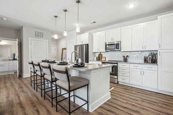 Modern kitchen with stainless steel appliances at 4000 Margaret Apartments, Greystar luxury apartments