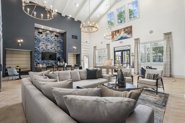 Modern living room with stylish furnishings at 4000 Margaret Apartments, luxury Greystar community