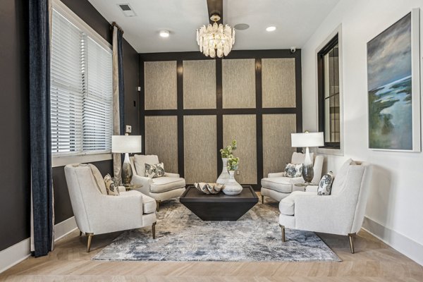 Spacious living room with modern decor at 4000 Margaret Apartments
