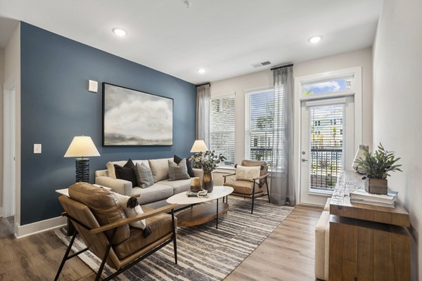 Spacious living room with modern decor at 4000 Margaret Apartments