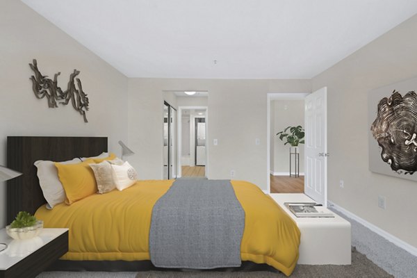 Spacious bedroom featuring modern decor at Columbia Crossing Apartments in Columbia
