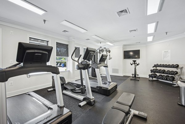 Modern fitness center with state-of-the-art equipment at Columbia Crossing Apartments