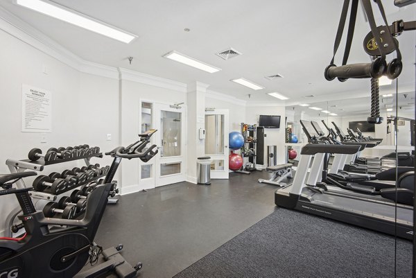 Modern fitness center with latest equipment at Columbia Crossing Apartments, offering health-focused amenities for residents
