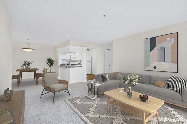 Spacious living room with modern decor and large windows at Columbia Crossing Apartments