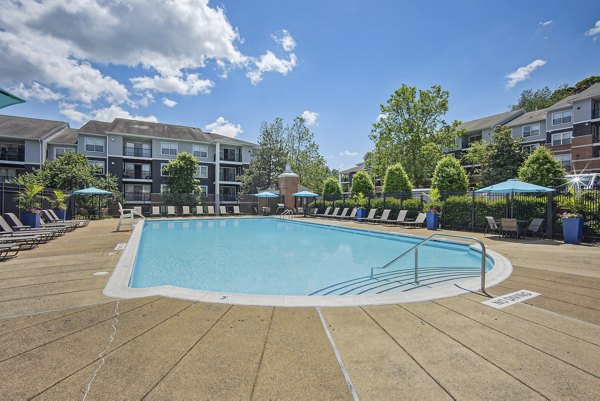Resort-style pool with sundeck at Columbia Crossing Apartments