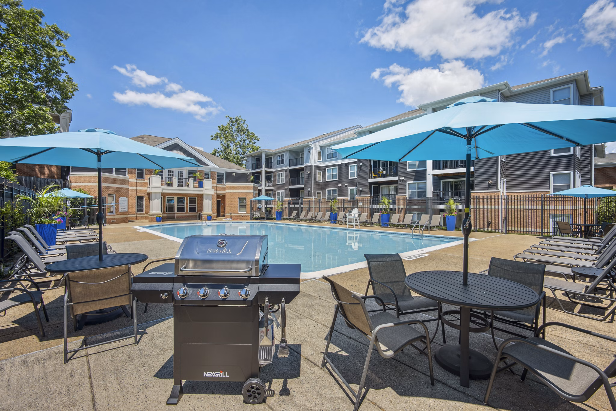 Modern outdoor grill area at Columbia Crossing Apartments, perfect for social gatherings and dining with friends