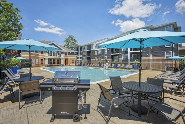 Modern outdoor grill area at Columbia Crossing Apartments, perfect for social gatherings and dining with friends