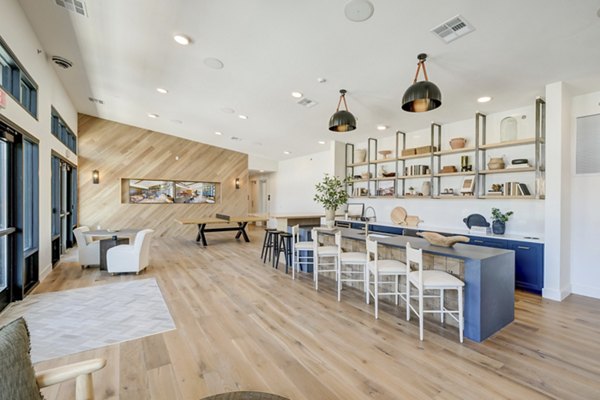 Clubhouse with elegant seating and contemporary decor at The Taylor at Greenway Apartments, luxury community living spaces