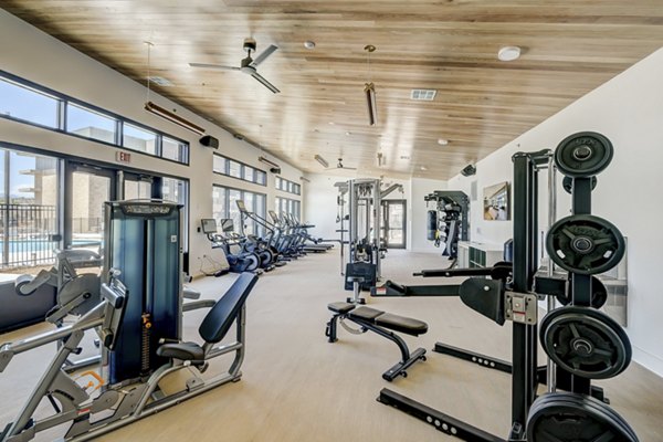 State-of-the-art fitness center with modern equipment at The Taylor at Greenway Apartments