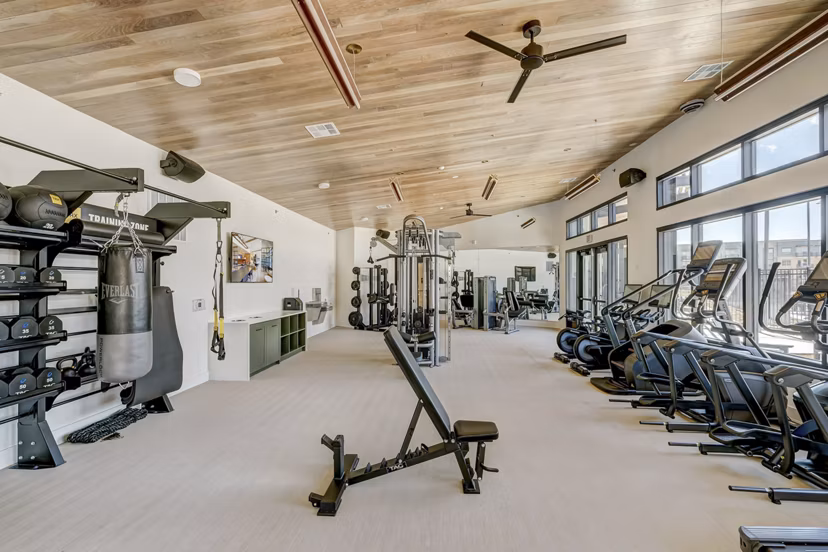 Modern fitness center with state-of-the-art equipment at The Taylor at Greenway Apartments
