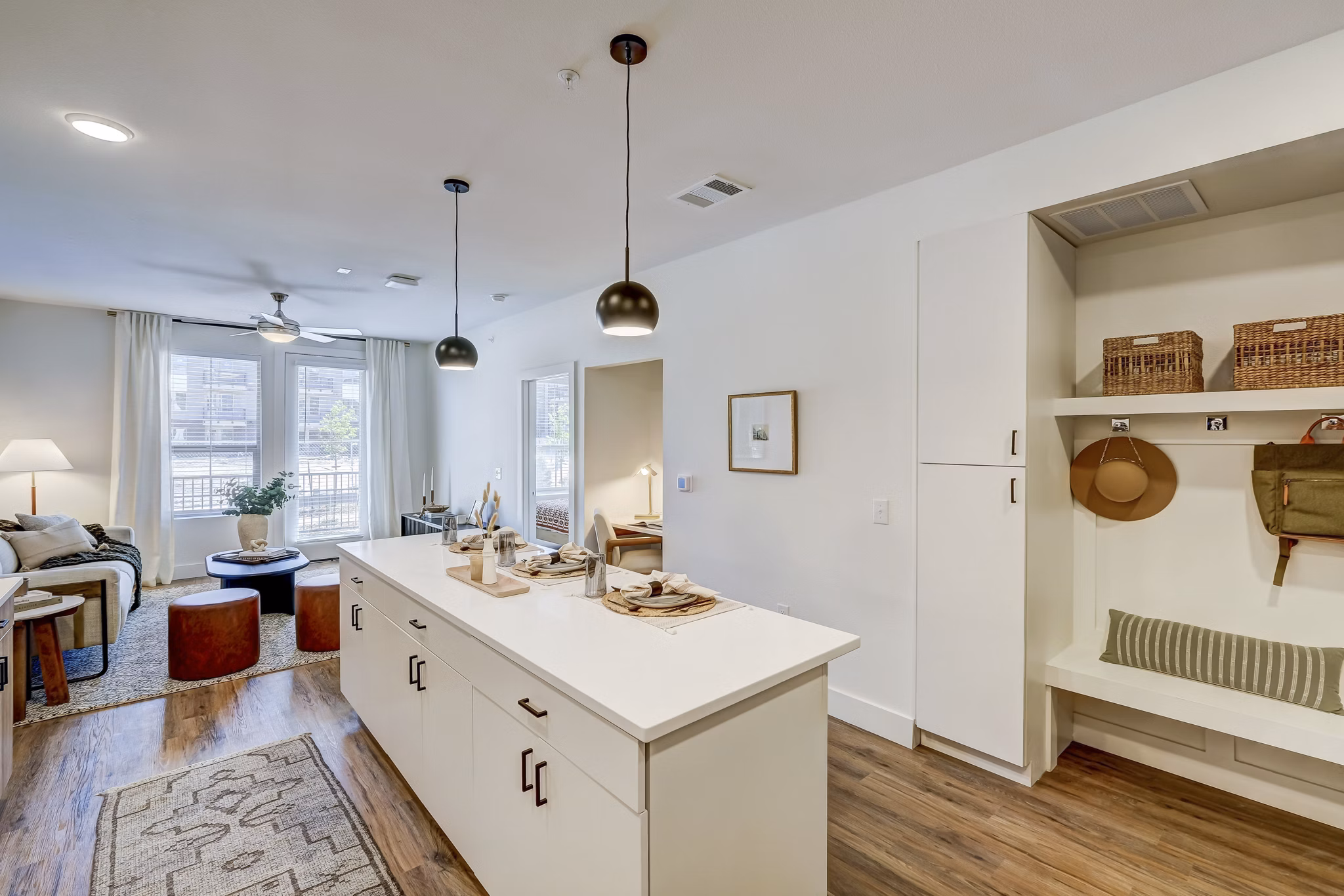 Modern kitchen with stainless steel appliances at The Taylor at Greenway Apartments in Houston, Texas