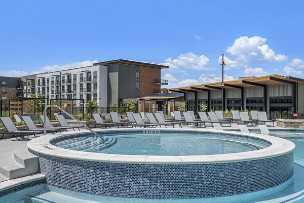 Relaxing outdoor hot tub at The Taylor at Greenway Apartments, a luxury community by Greystar, offering comfortable amenities and leisure spaces