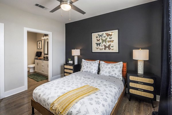 Cozy bedroom with modern furnishings at Broadstone Berry Hill Apartments