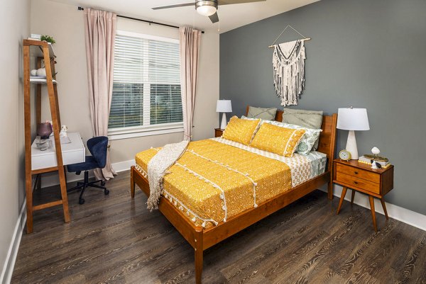 Modern bedroom with stylish furnishings at Broadstone Berry Hill Apartments, offering luxury living spaces in a vibrant Nashville community