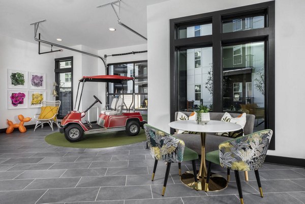 Contemporary clubhouse with open seating and billiards at Broadstone Berry Hill luxury apartments