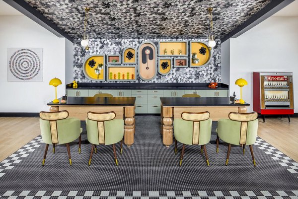 Clubhouse lobby with modern decor at Broadstone Berry Hill Apartments featuring luxury design elements